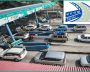 Vehicles passing through an NHAI FASTag toll plaza